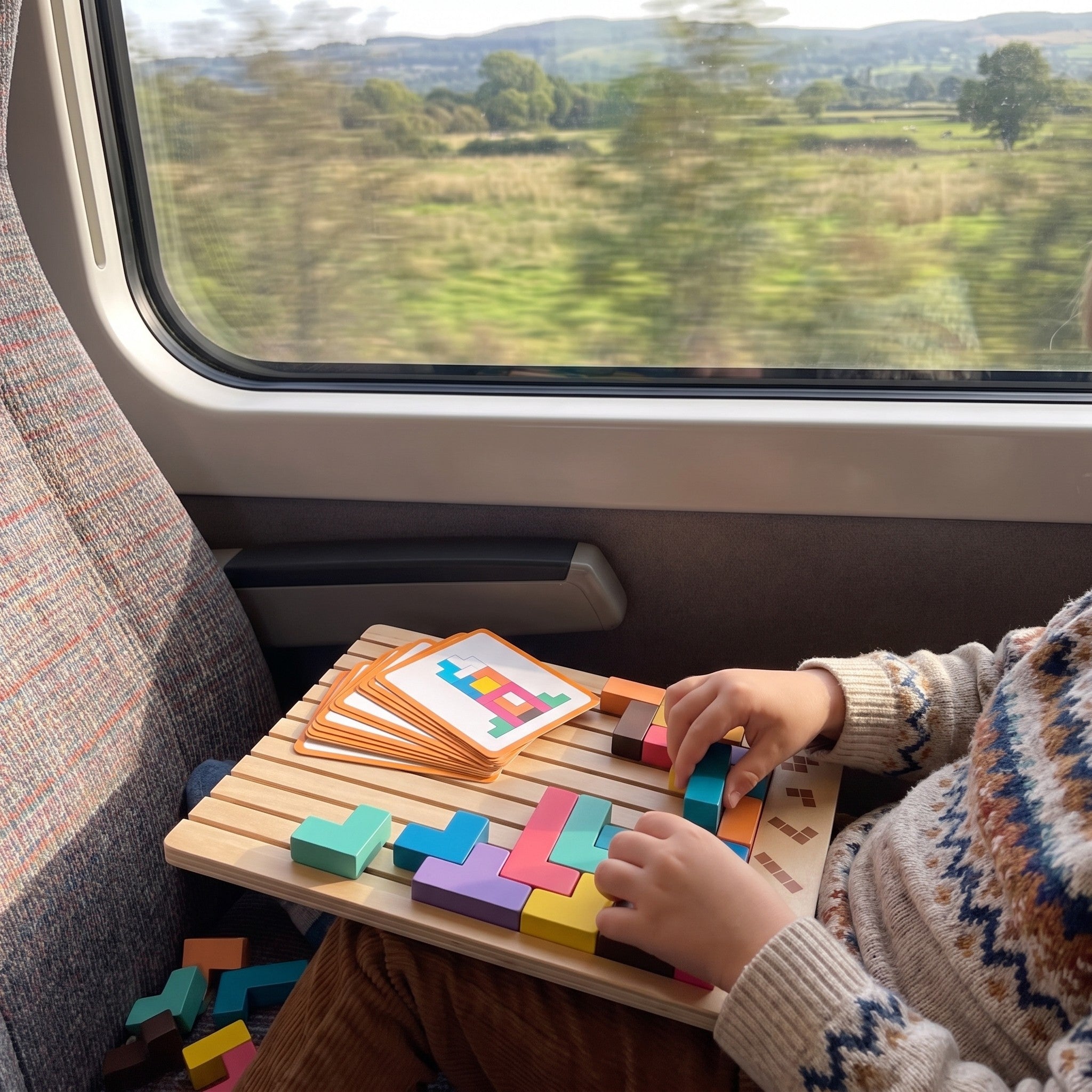 Le Tetris en bois Miloubo utilisé dans le train
