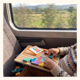 Le Tetris en bois Miloubo utilisé dans le train